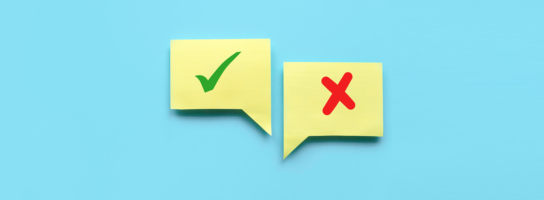 The image displays a digital illustration of two sticky notes with a checkmark and an  X  symbol on them, placed against a blue background.